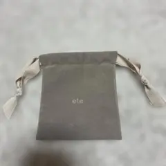 ete 巾着ポーチ　未使用品のサムネイル