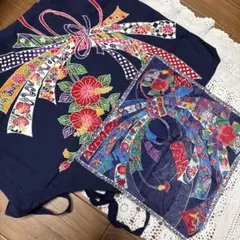 沖縄特産の紅型染め柄のエプロンと、同柄のハンカチのペア