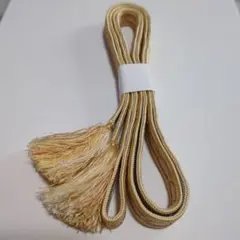 クリーム色の帯ひも 金糸装飾 房付き