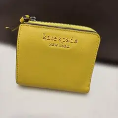 kate spade 二つ折り財布 イエロー