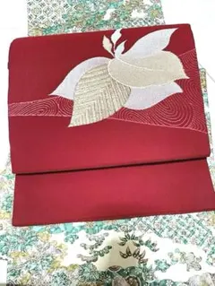 葉柄　金銀　臙脂色　名古屋帯　化繊