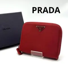 プラダ 折り財布 ラウンドファスナー コンパクトウォレット 赤 三角タグ金具