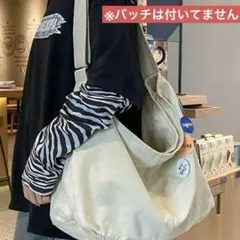 メッセンジャーバック ニュースペーパーバック 白大容量男女兼用バッグ 斜めがけ