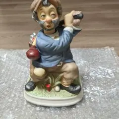 チェロを弾く男性の陶器製フィギュア オルゴール | Mercari