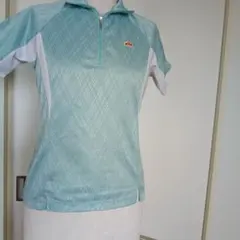ellesse テニスウェア ハーフジップ 半袖シャツ ライトブルーSのサムネイル