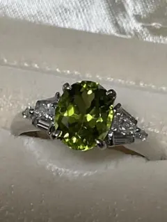 パーセルジュエリー ポンポネリング6mm ペリドット×ブラウン