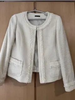 襟なしコート、サイズL、ベージュ、ラメ入り、ポケット付き。