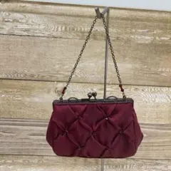 真紅のがま口タイプパーティバッグ