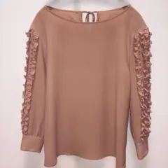 フリル付き七分袖ピンクトップスのサムネイル