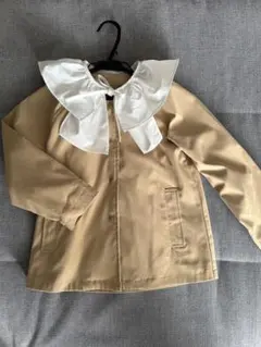 petit main フリル付きコート　ベージュ