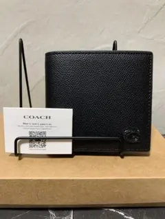 新品・未使用】COACH ブラック 二つ折り財布 型番:CJ883 - メルカリ
