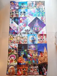 「東京ディズニーリゾート・アンコール！ザ・モーメンツ展」のオリジナルバスタオル