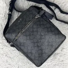 コーチ PVC ショルダーバッグ ファスナー ロゴ型押し シグネチャー 黒