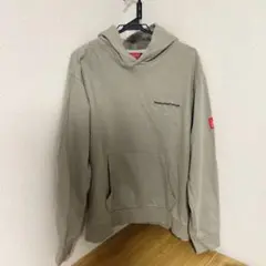 ベージュ パーカー