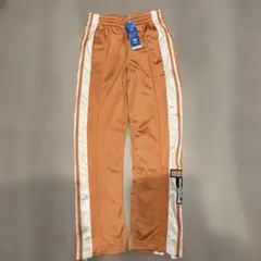 adidas トラックパンツ オレンジ