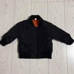 黒のボンバージャケット（オレンジ裏地）