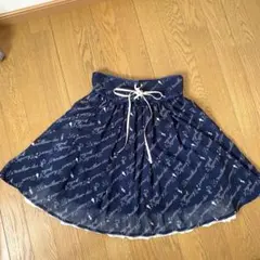 axes femme 膝丈 不思議の国のアリス スカート