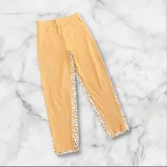 ルカ　ボトムス　スキニーパンツ　幾何学模様　茶系オレンジ　フリーサイズ