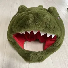 恐竜顔の被り物