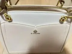 アンドシュエット ビジュー付きハンドバッグ