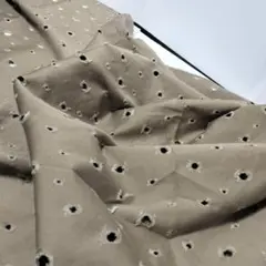 C ダメージ加工　112×1m　中肉綿　つや少し有　暗カーキ系 　穴開き加工