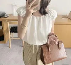 nugu バックリボンシャーリングブラウス/アイボリー