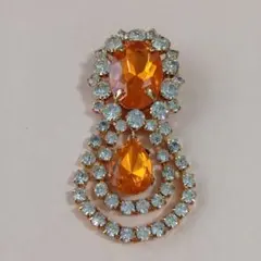 オレンジクリスタルのブローチ