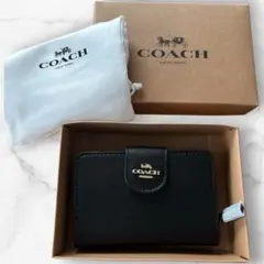 COACH 二つ折り財布 黒　新品　レザー　ミディアム　コーナー　ウォレットのサムネイル
