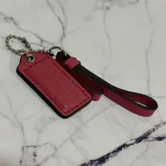 COACH レザー タグ型キーホルダー ピンク