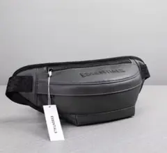 ESSENTIALS グレー クロスボディバッグ
