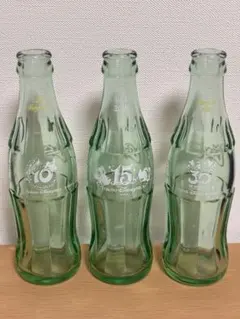 ディズニー周年記念デザイン　コカ・コーラ 空き瓶 3本セットのサムネイル