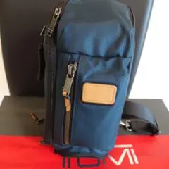 美品】TUMI 232399NVYRE ケリー スリングバッグ - メルカリ