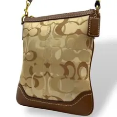 コーチ ショルダーバッグ 斜め掛け キャンバス ブラウン シグネチャー チャーム