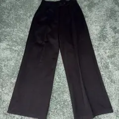 “Black wide-leg slacks”