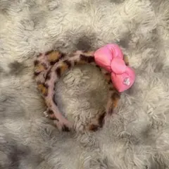 ヒョウ柄ピンクリボンカチューシャ ユニバ