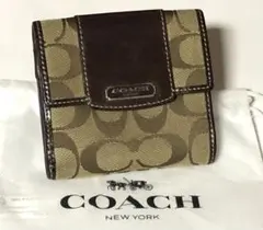 美品COACHコーチ☆三つ折り財布シグネチャー☆コーチロゴ入保存袋付
