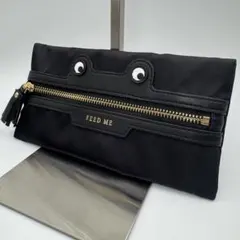 【未使用に近い】アニヤハインドマーチ 黒 ポーチ ANYA HINDMARCH（アニヤハインドマーチ）の「ANYA HINDMARCH