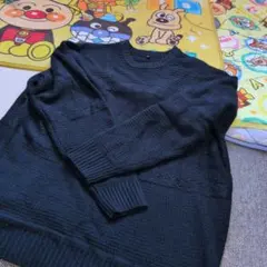 黒い編み込みデザインのセーター 4L