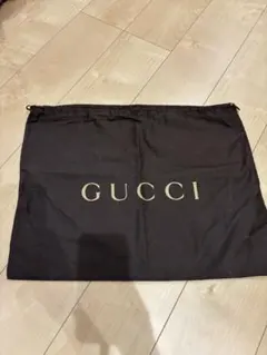 GUCCI ロゴ入りバック収納袋