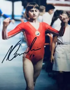 体操選手 ナディア・コマネチ 直筆サイン入り写真 金メダリスト 白い妖精　tt 体操選手 ナディア・コマネチ 直筆サイン入り写真 金メダリスト