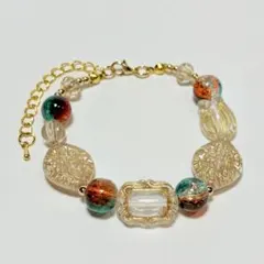 【ハンドメイド】アンティーク風アクリルビーズブレスレット グリーン＆オレンジ