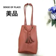 巾着ショルダー　2WAYショルダーバッグ タッセル　フリンジ　レザー調　縦型