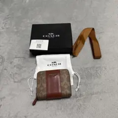 コーチ　二つ折財布のサムネイル