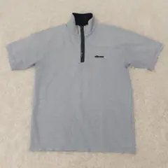 ellesse ハーフジップ 半袖シャツ ライトブルー Mサイズのサムネイル