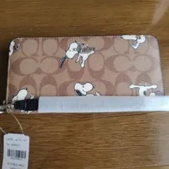 新品　コーチ　スヌーピーコラボシグネチャーラウンドファスナー長財布　ストラップ付