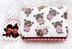 《新品・未使用・タグ付き》 日焼け　モンチッチちゃん♡ 総柄　がま口 財布のサムネイル