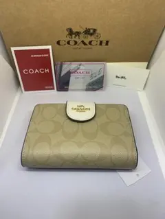 COACH コーチ C0082 二つ折り財布　シグネチャー　カーキ×チョーク