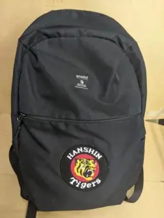 anello ブラックリュックにHANSIN Tigers刺繍ワッペン