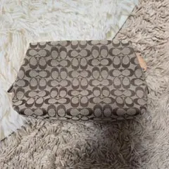 COACH ロゴ入りキャンバスポーチ