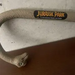 Jurassic Park 恐竜の肩マッサージ棒　中古品　擦れ傷あり　約４０㌢のサムネイル